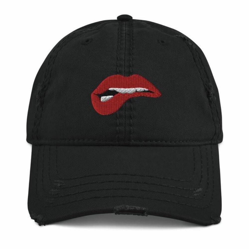 Biting Lip Distressed Dad Hat